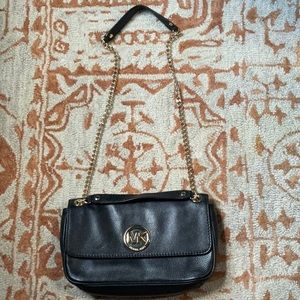 MK purse with magnetic back pocket and built in wallet inside